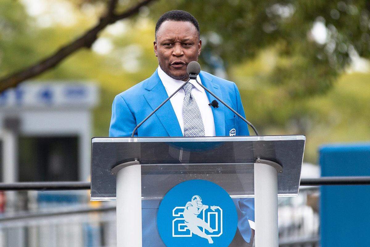 Barry Sanders speaks during the ceremony to unveil his statue outside of Ford Field in Detroit on Saturday, Sept. 16, 2023.