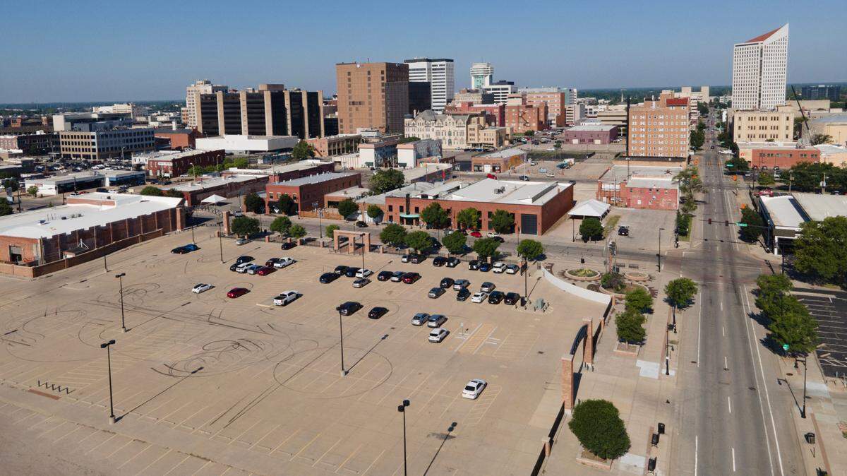 Public parking lot on the southeast corner of St. Francis and Second Street. The city of Wichita owns more than 8,000 of the approximately 12,000 available parking spaces downtown and plans to introduce new meters and higher parking rates in 2025.