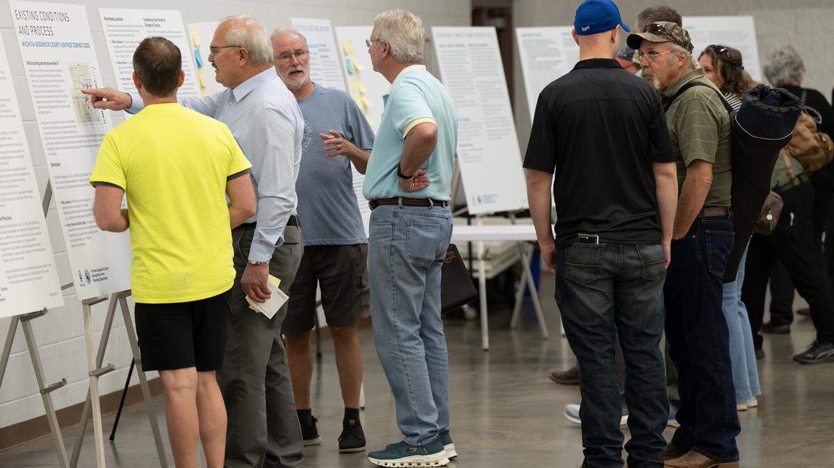 The Wichita-Sedgwick County Metropolitan Area Planning Department held an informational session and presentation on zoning policies during a data center public meeting at the Sedgwick County Extension Center.