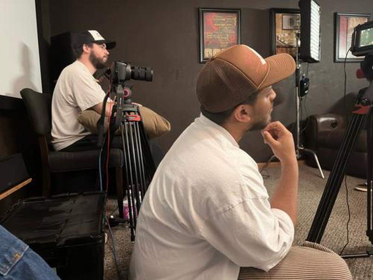 Co-directors Caleb Carnell, right, and Maximum James, left, at work on “The Madwest Theory: A Danoiz Documentary.”