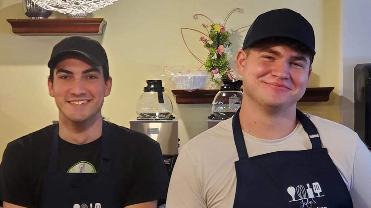 Ethan Woodhams, 22, left, and Jacob Laflin, 20, are the owners of Jake’s Fresh Bakes, which will celebrate its grand opening on Monday on the lower level of the Garvey Center.