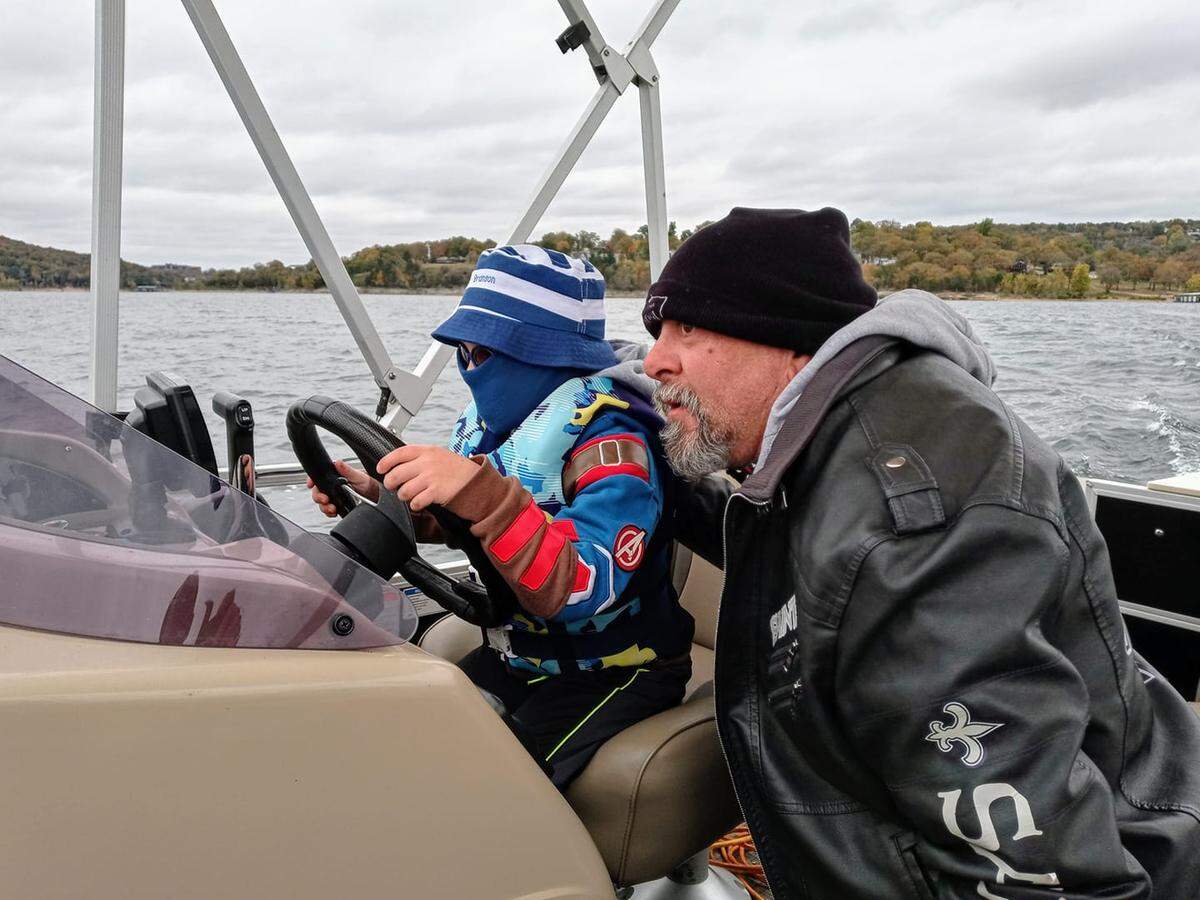 Tim Granger, in a recent photo with his grandson, Sawyer, died early Saturday morning of a heart attack.