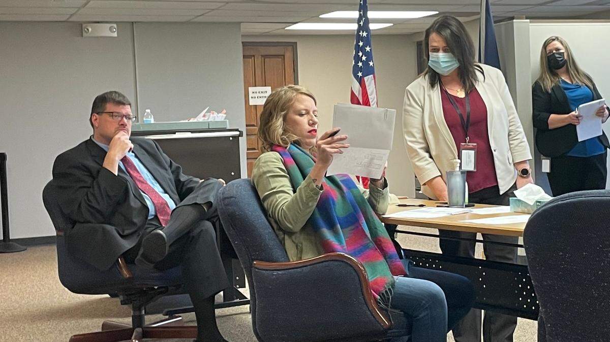 Sedgwick County Commissioner Lacey Cruse consults with Election Commissioner Angela Caudillo during Friday’s meeting of the county canvassing board.
