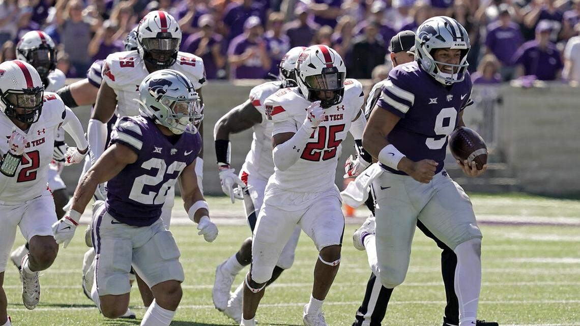 Kansas State quarterback Adrian Martinez (right) runs for a touchdown during the second half against Texas Tech on Saturday, Oct. 1, 2022, in Manhattan, Kan. Kansas State won 37-28. TCU must force Martinez to regress in order to take down the Wildcats.