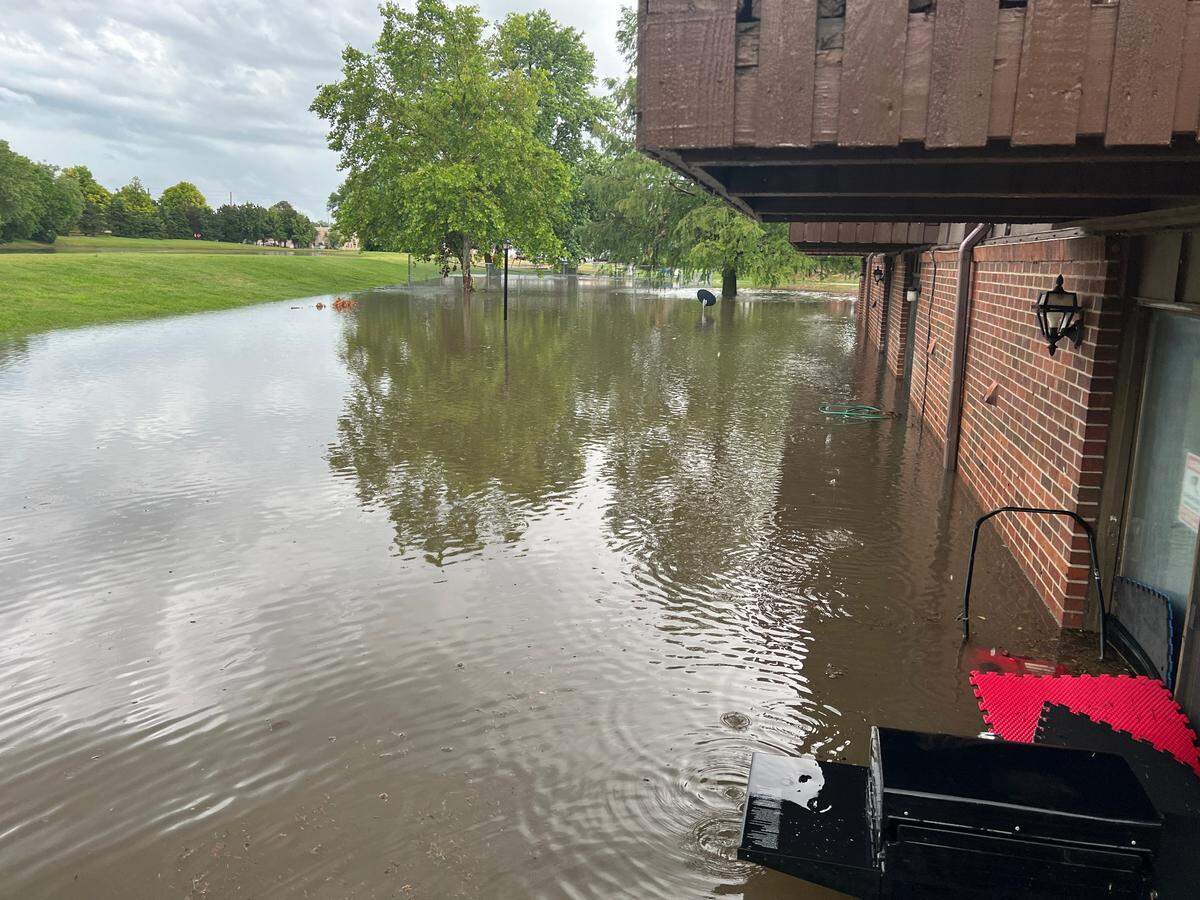The walk-out basement of Tracy Toguchi’s townhome near Douglas and Rock flooded during Tuesday’s storm.
