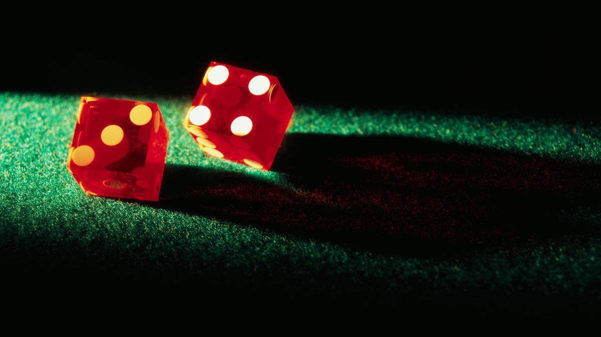 A double shooting that left one man dead and another hurt earlier this summer stemmed from a fight during an illegal craps game.