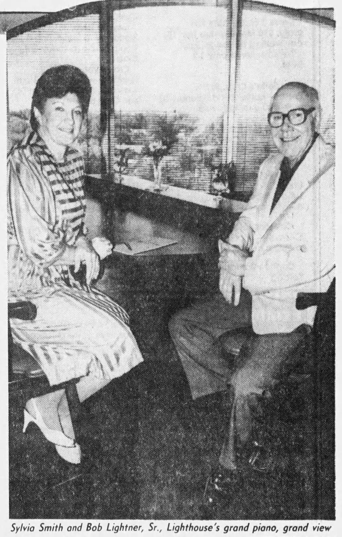 Bob Lightner Sr., right, poses in the sixth floor restaurant of the former Holiday Inn East at 7335 E. Kellogg. Lightner, the hotel’s original franchisee, opened a restaurant there called The Lighthouse in 1984.