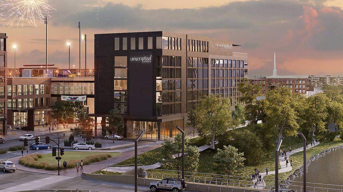 Unscripted Hotels is still the brand coming to the new development around Riverfront Stadium, but there are so many changes to the overall plan that construction won’t start for another year.