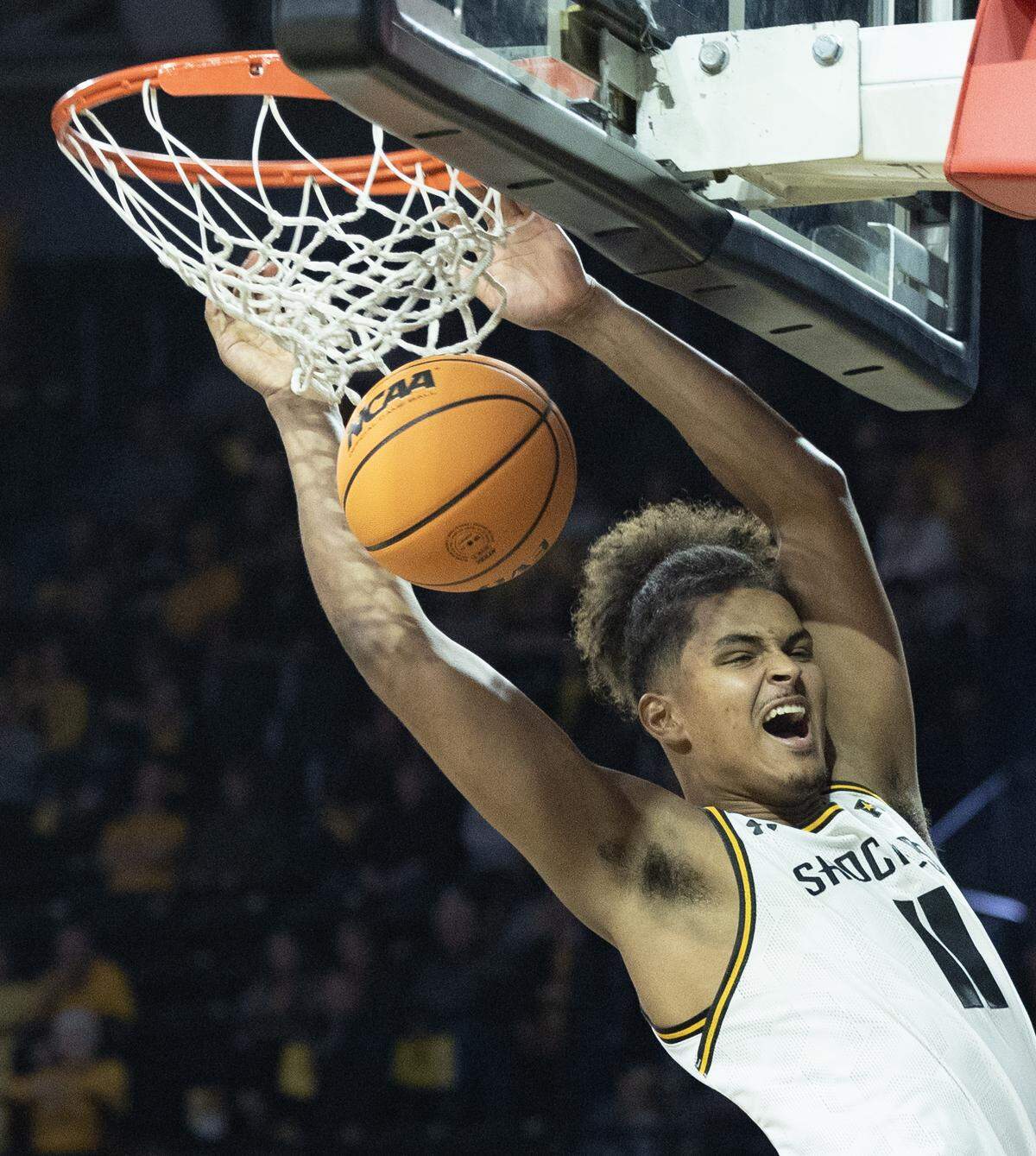 Wichita State’s Kenny Pohto dunks the ball against Lipscomb during the second half of their season opener on Monday night at Koch Arena.