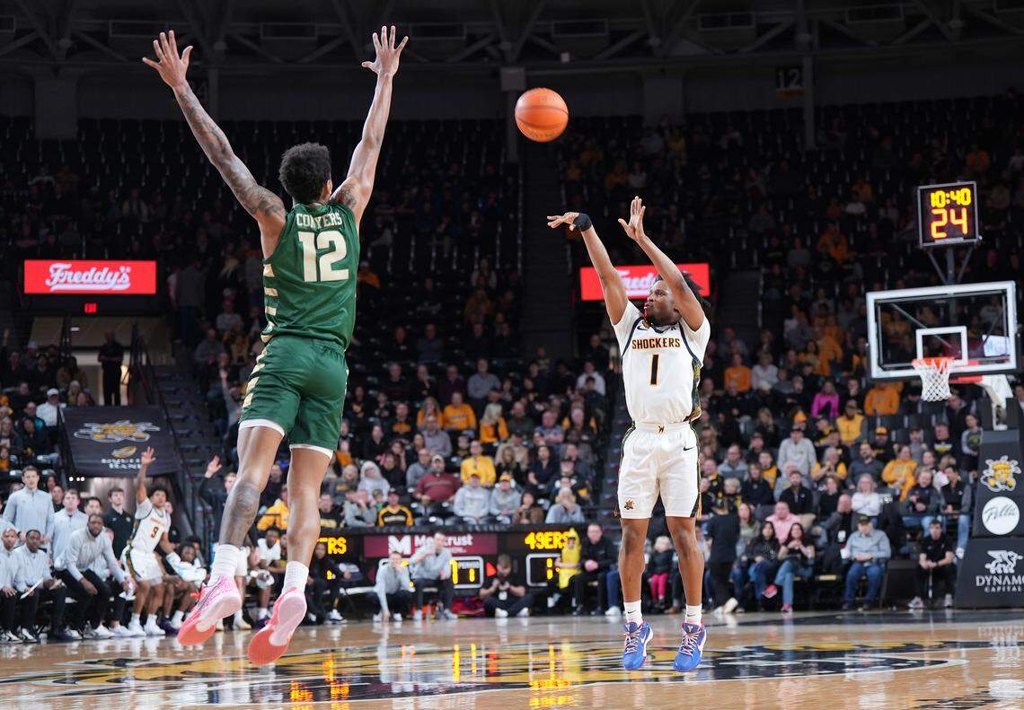 Wichita State’s Kenyon Giles drains a three-pointer in the first half against Charlotte.