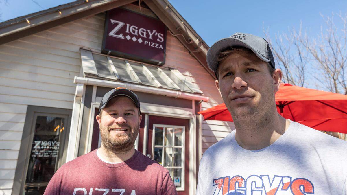 Ryan, left, and Jamie Verbeckmoes opened Ziggy’s Pizza 10 years ago.
