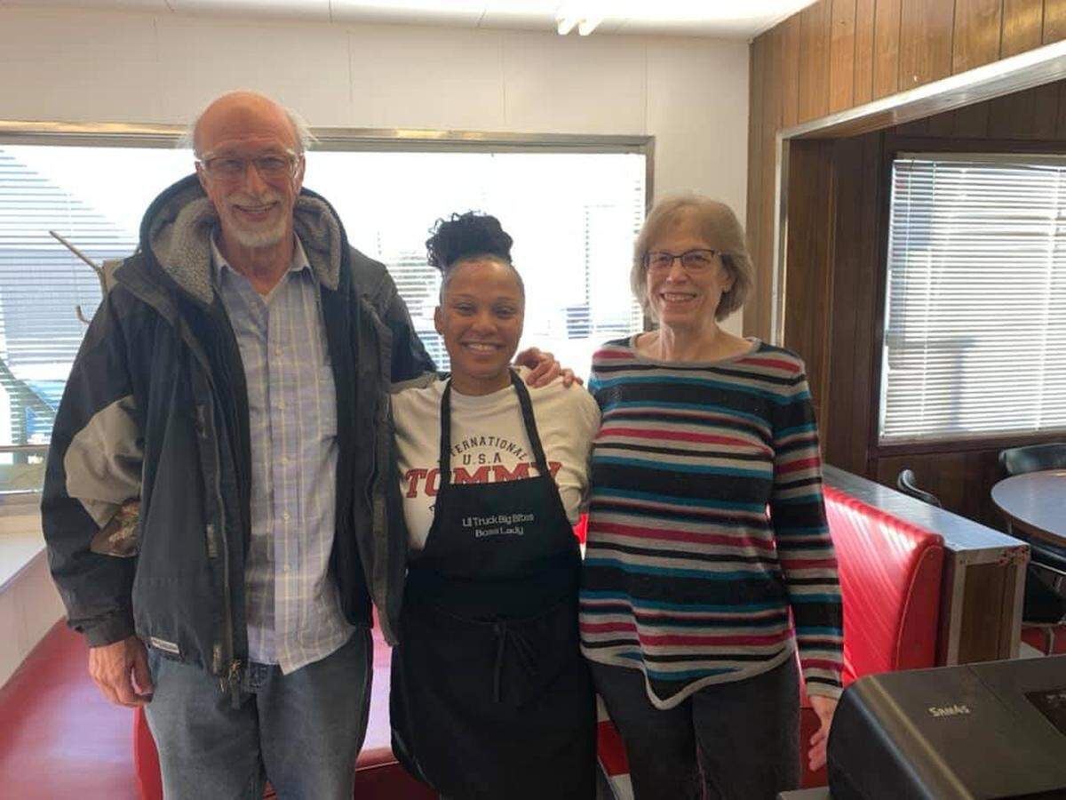 Shea Nelson, center, previously had a food truck but now is running the kitchen at the recently reopened Brints Diner.