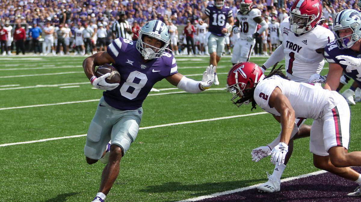 Kansas State Wildcats wide receiver Phillip Brooks (8) scores a touchdown during the second quarter against Troy Trojans cornerback Reddy Steward (2) at Bill Snyder Family Football Stadium on Sept. 9, 2023.
