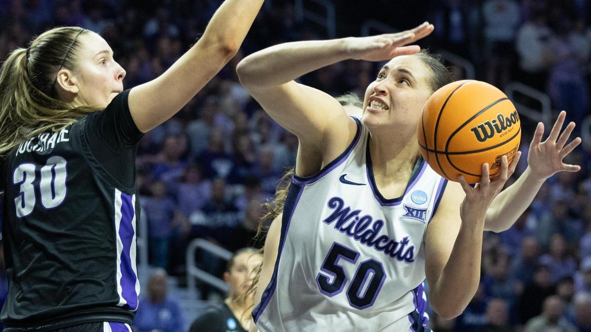 Kansas State’s Ayoka Lee goes to the basket against Portland defender Lucy Cochrane during the second half of an NCAA Tournament in Manhattan.