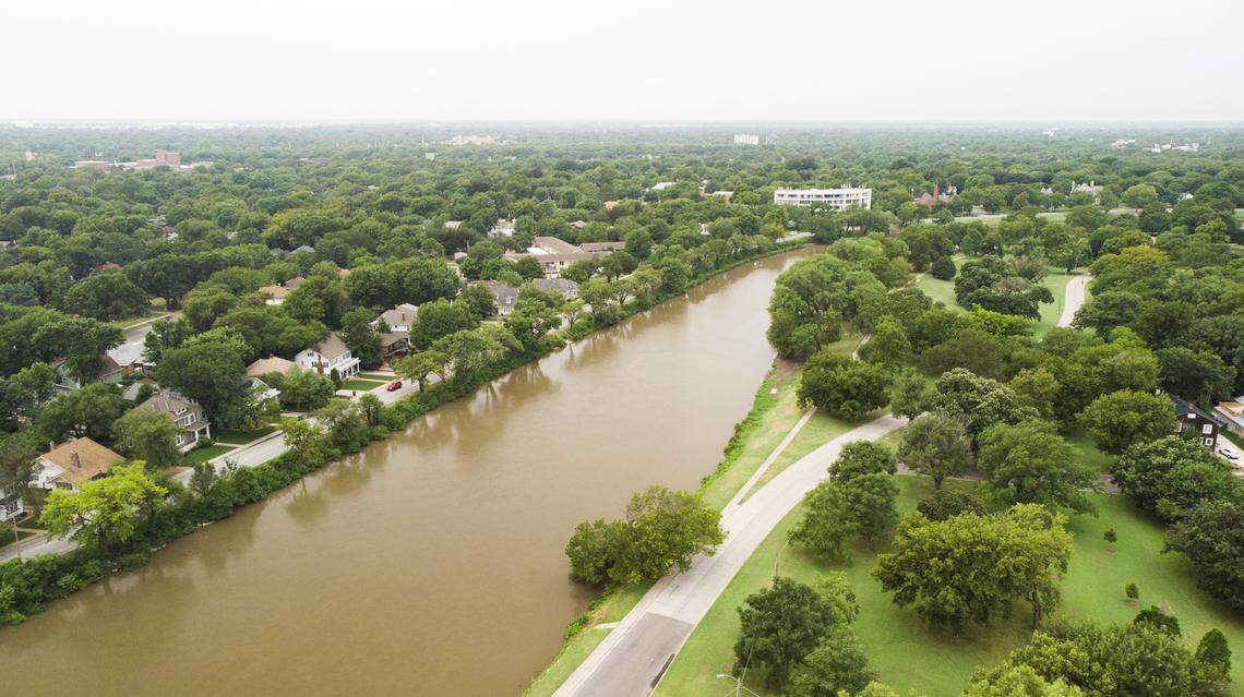 A view of Riverside along the Little Arkansas River in 2019. A 2018 urban tree canopy assessment by the city found the existing tree canopy removed 3 million tons of air pollution annually, valued at $107 million; absorbs $4.7 million worth of stormwater runoff; and holds $100 million worth of stored carbon.
