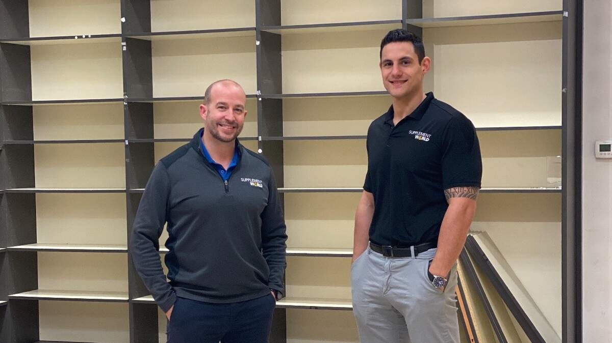 Supplement World owners Jeff McAnarney, left, and Dustin West are unexpectedly opening a new store at Towne East Square where GNC used to be. The deal came together in just days.