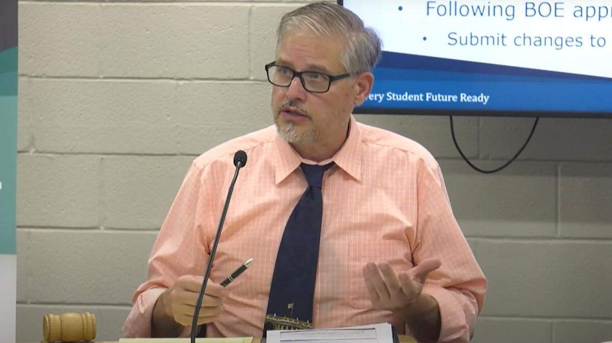 Stan Reeser, president of the Wichita school board, addresses the rest of the board about USD 259’s redistricting plans.