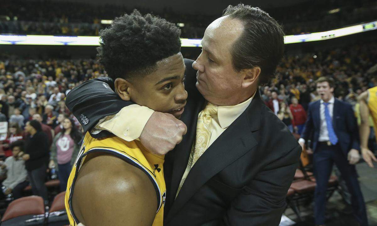 Wichita State coach Gregg Marshall grabs freshman guard Grant Sherfield into a tight hug after Sherfield’s second half effort was the difference in the Shockers’ 80-75 win against Oklahoma on Saturday at Intrust Bank Arena.