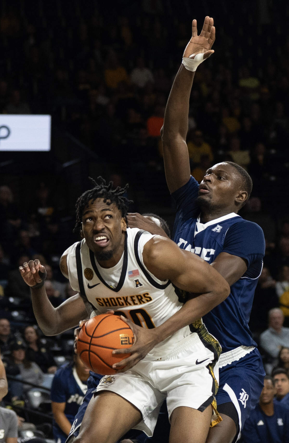 Wichita State’s Emmanuel Okorafor gets the ball under the basket against Rice.