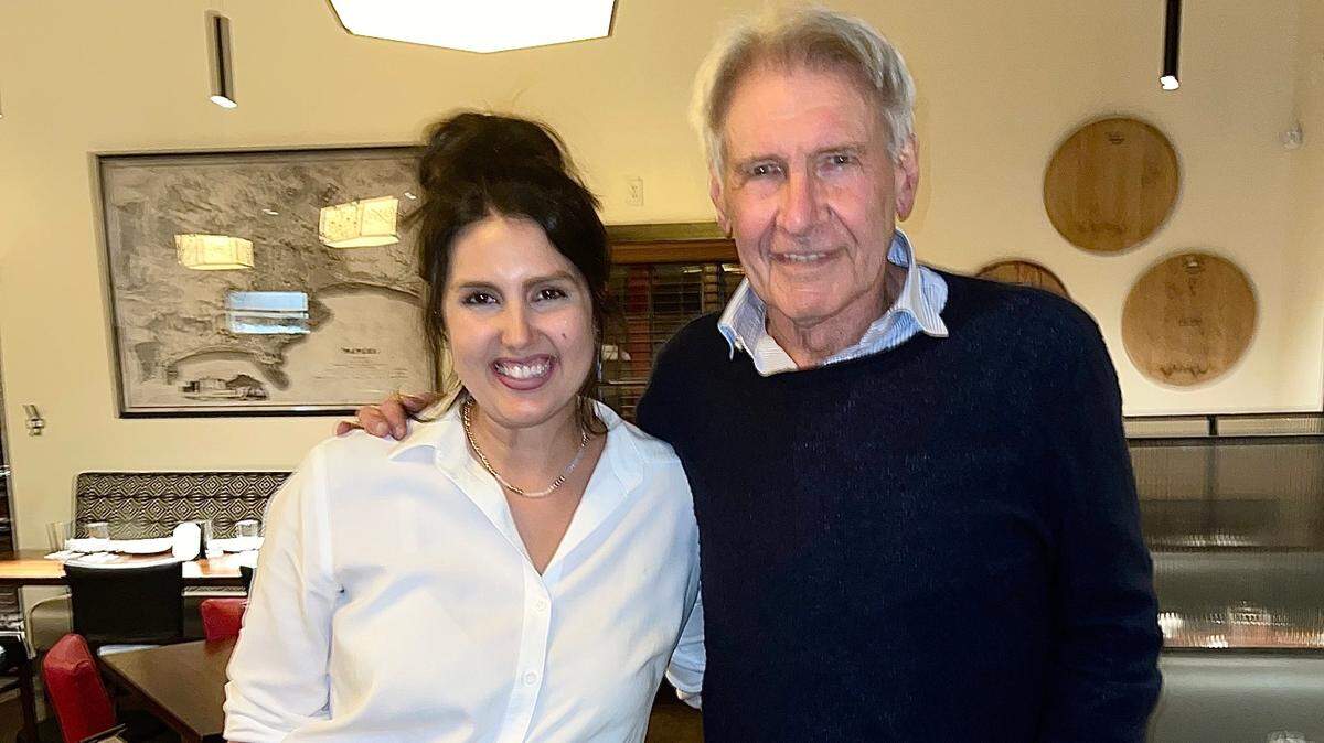 Grace Whitmire, left, waited on Harrison Ford when he dined at Napoli Italian Eatery on Monday evening.