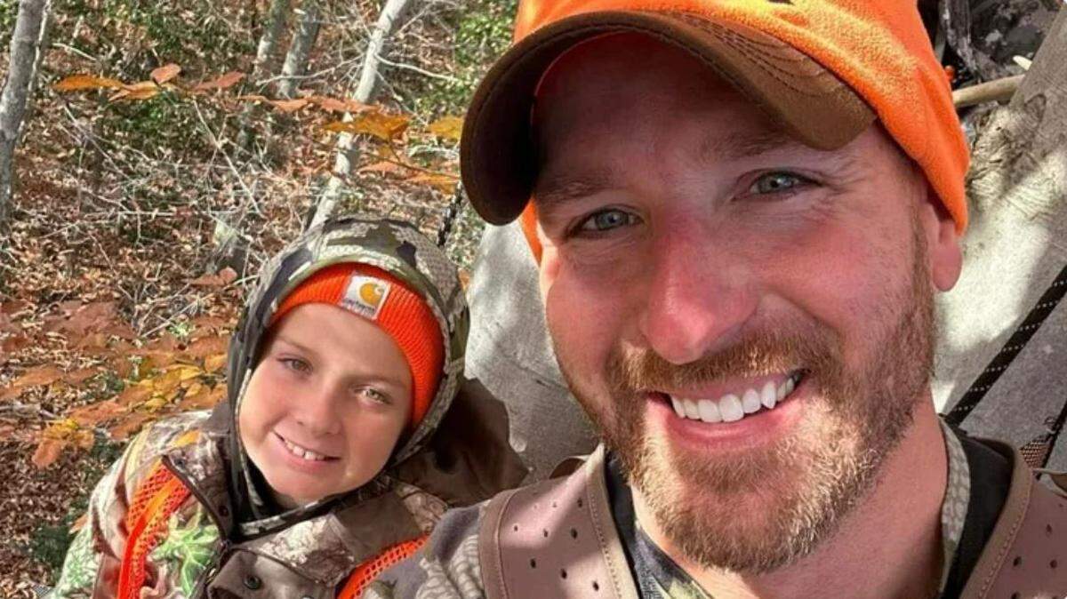 A GoFundMe has been set up to help Jonathan Boyd’s oldest son, who is in a tree stand with his father in this photo. Boyd died in the American Airlines Flight 5342 crash.