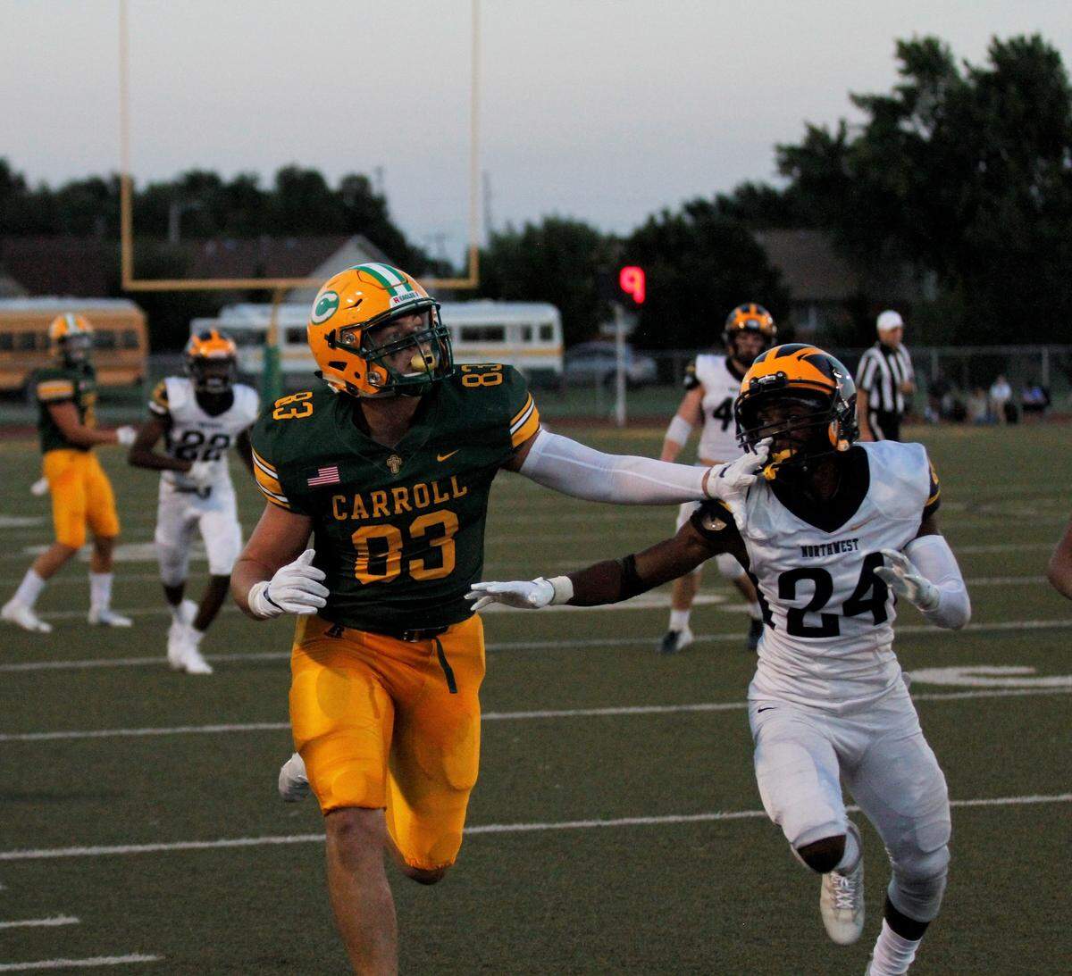 Bishop Carroll senior tight end Clay Cundiff tracks a pass along the sideline against Wichita Northwest during the Grizzlies 23-22 win over the Golden Eagles on Friday night. (Aug. 31, 2018)