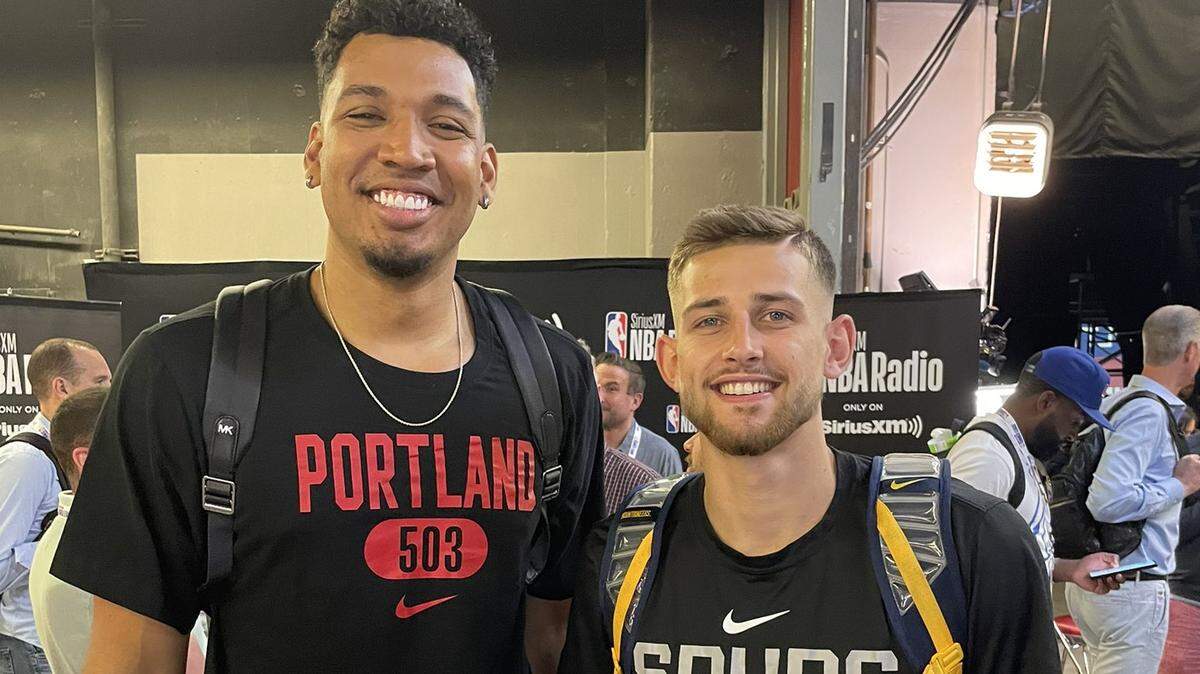 Former Shocker big man Jaime Echenique (left) poses with former Wichita State teammate Erik Stevenson (right) after their NBA Summer League game in Las Vegas on Sunday.