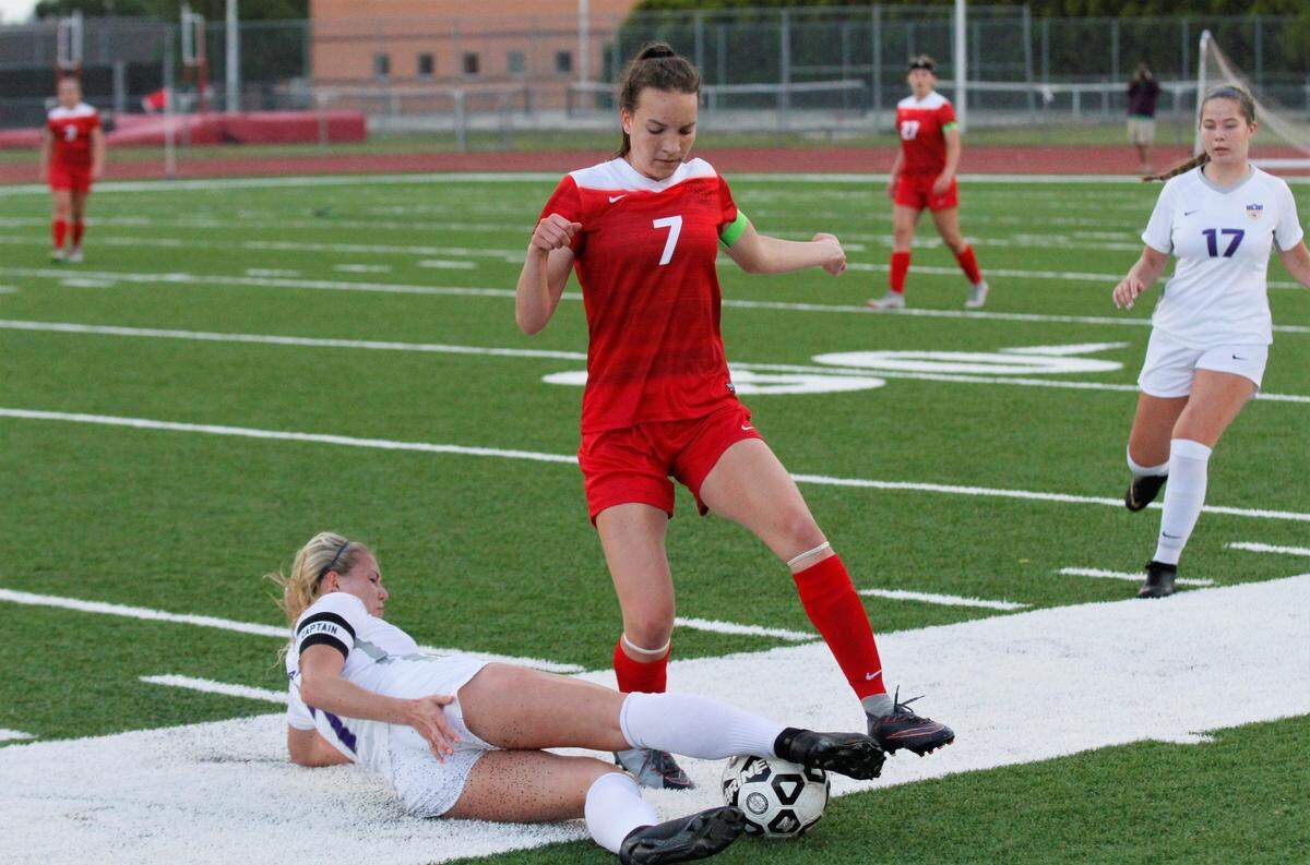 Valley Center’s Emily Breault and McPherson’s Jaycee Burghart