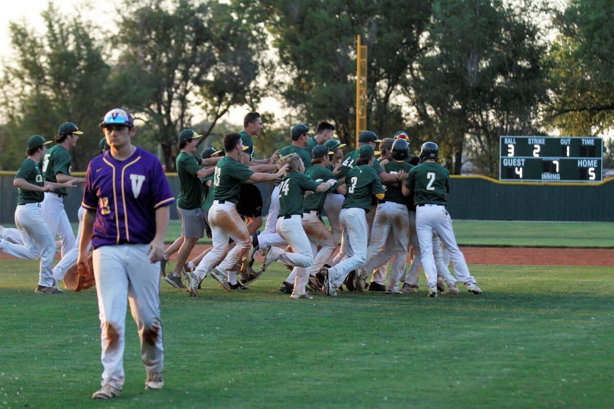 Carroll celebrates it regional tournament victory after senior RJ Lara delivers the walk-off winner.