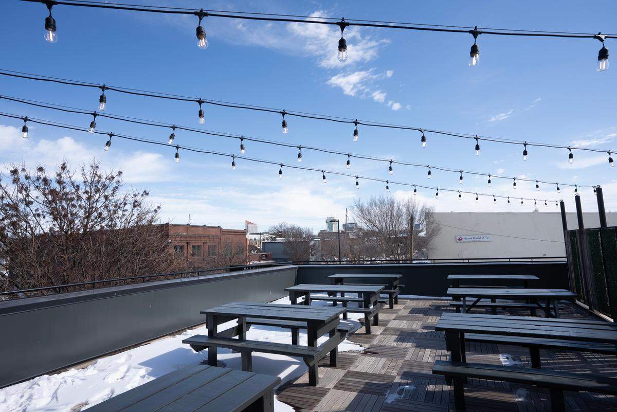 The Wichita Brewing Company’s new location in Delano has a rooftop bar with views of downtown and West Douglas.