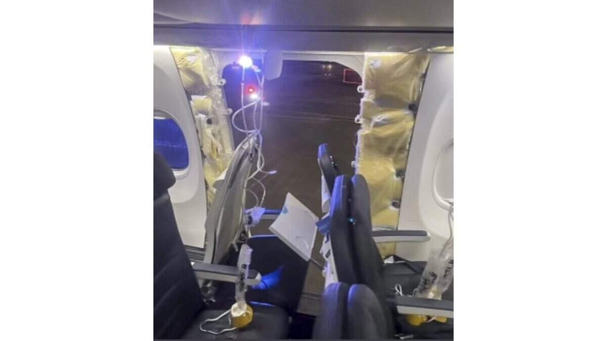 This photo provided by an unnamed source shows the damaged part of an Alaska Airlines Boeing 737 Max 9, Flight 1282, which was forced to return to Portland International Airport on Friday after part of its fuselage came off.