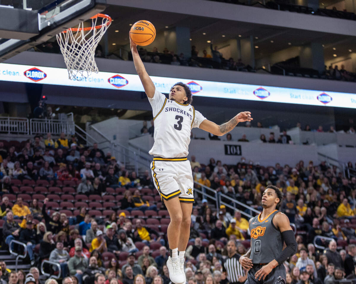 Wichita State’s Craig Porter Jr., makes a layup against Oklahoma State during the first half of their game at Intrust Bank Arena on Saturday night.
