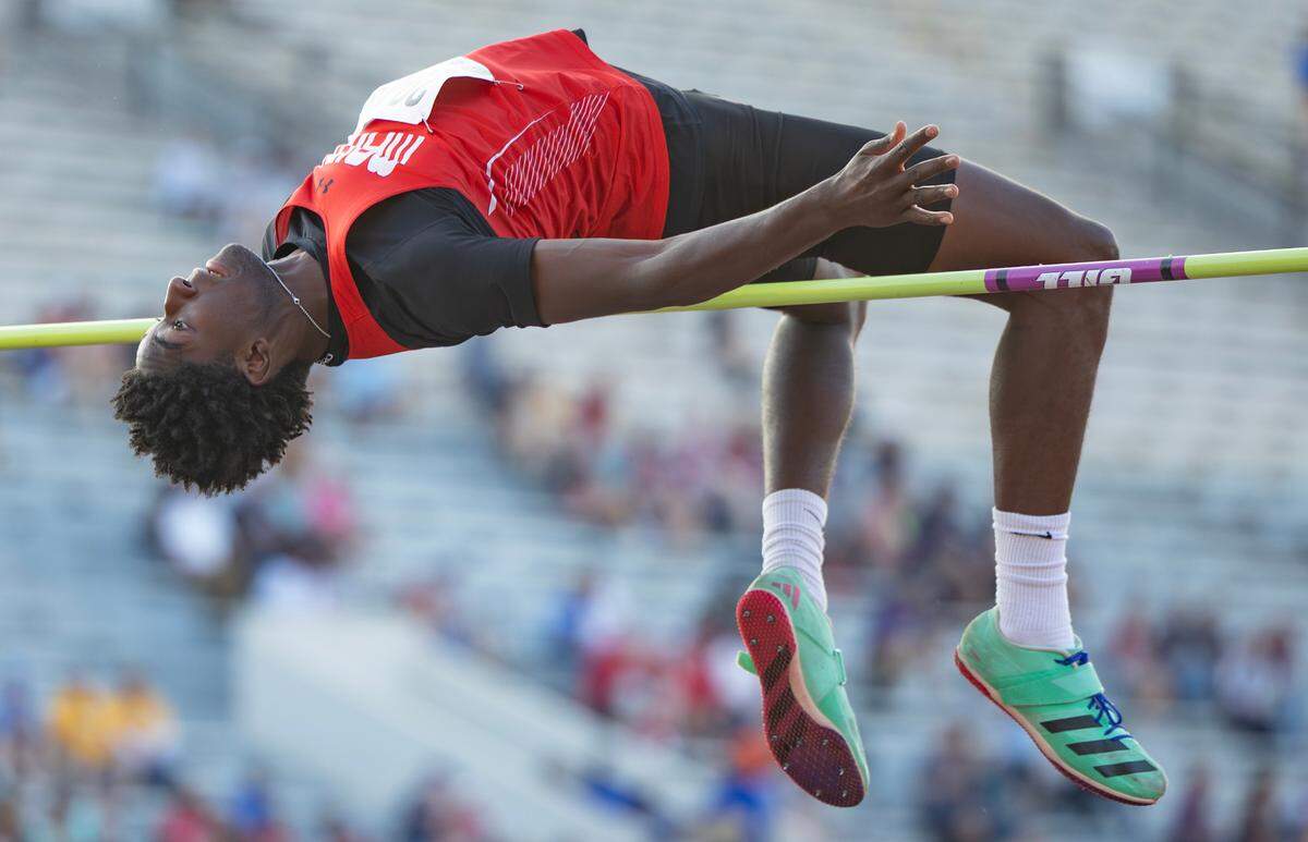 Alan Hanna of Maize set a Kansas State Track and Field Championship high jump record with a jump of seven foot, three and half inches.