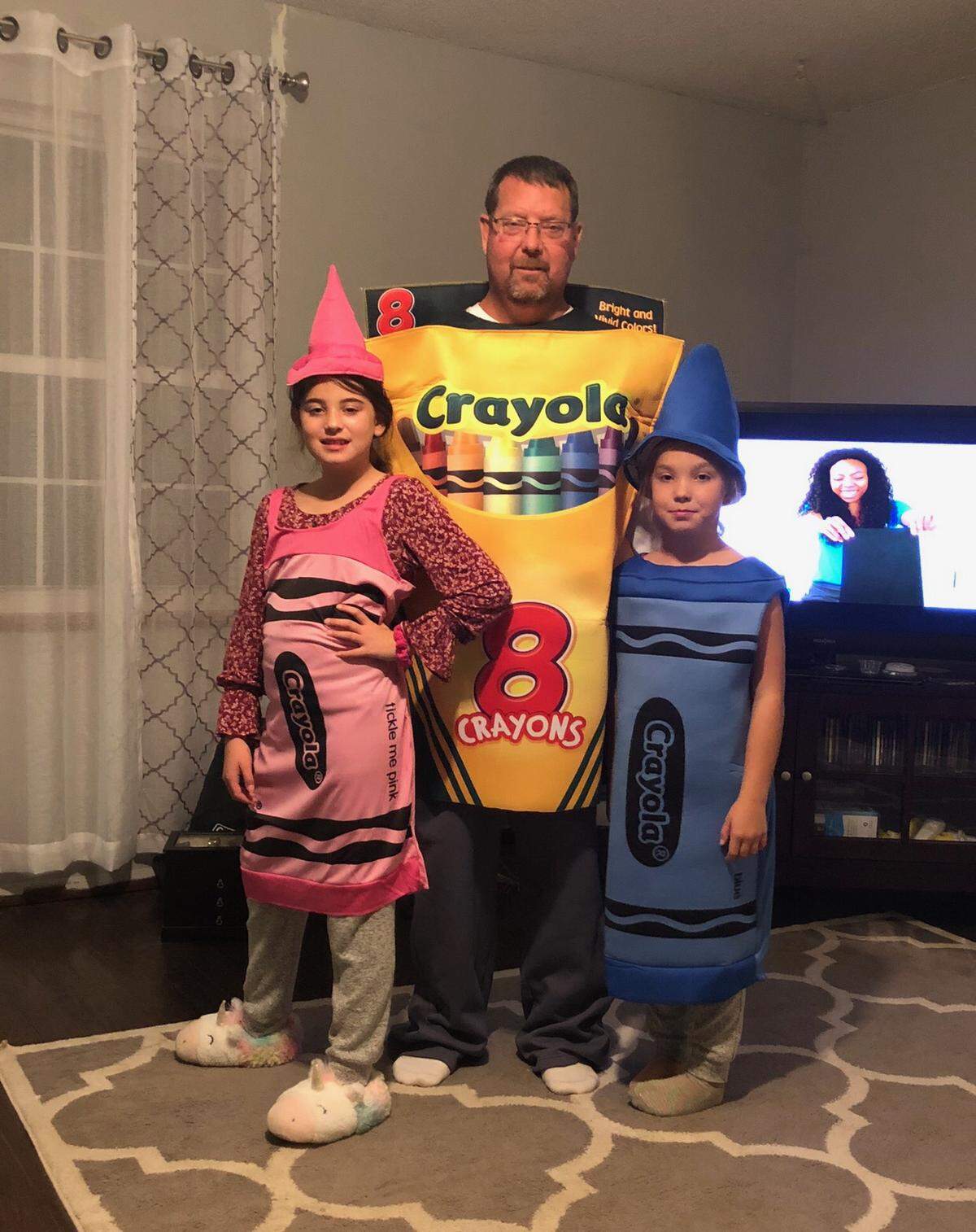 Aaron Flores with his two daughters, Ryann and Haley.