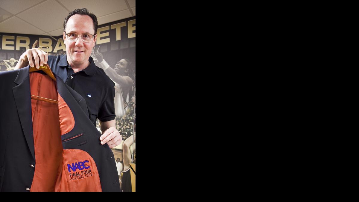 Gregg Marshall holds the blazer he received from the Final Four Coaches Club last week in Dallas. 


