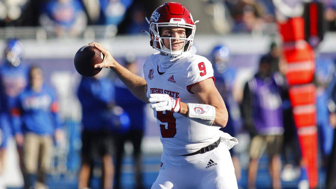 Fresno State quarterback Jake Haener looks to pass the ball against Boise State during the first half of an NCAA college football game for the Mountain West championship, Saturday, Dec. 3, 2022, in Boise, Idaho. (AP Photo/Otto Kitsinger)