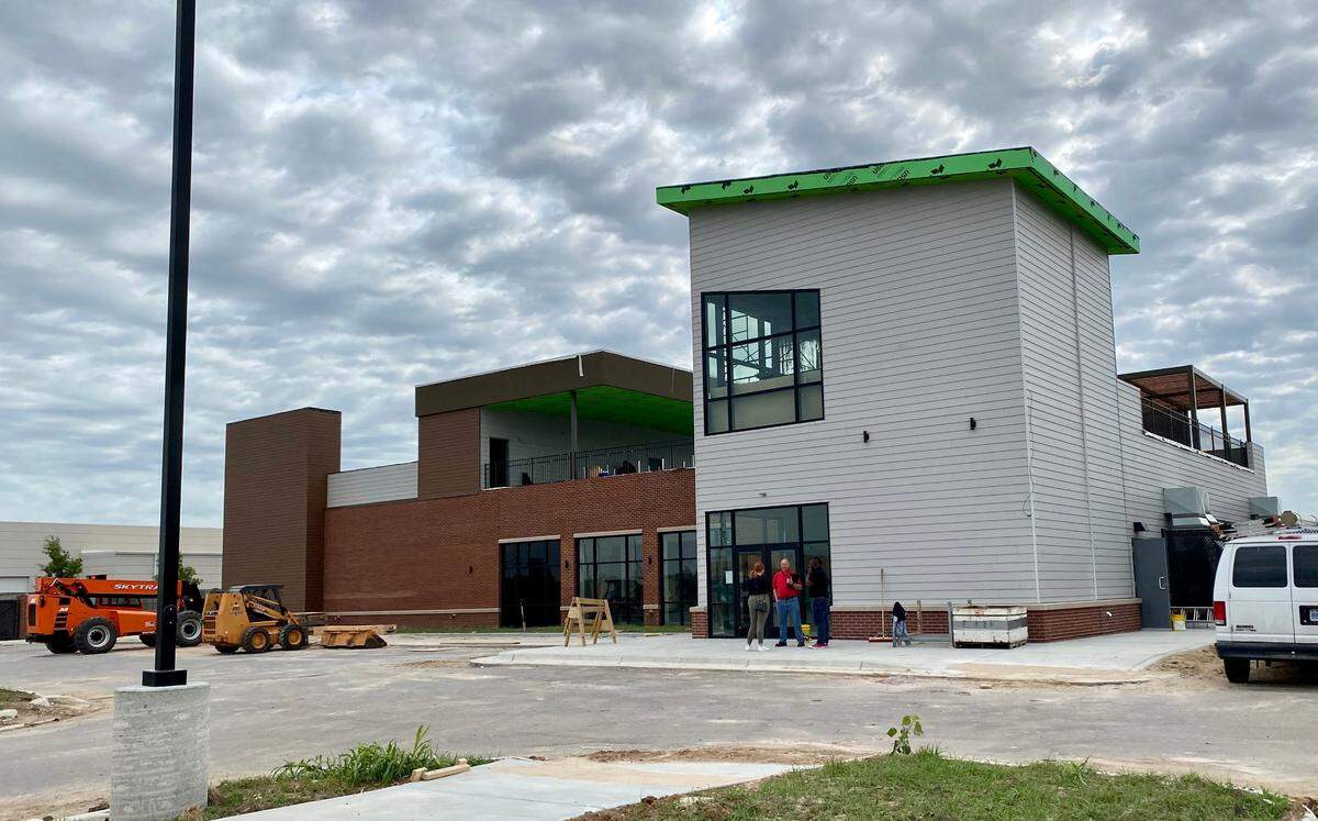 Construction continues on The Sandbox, which should open later this summer in Derby with a two-story restaurant, indoor and outdoor pickleball courts and sand volleyball courts.