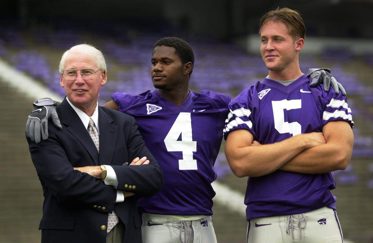Kansas State Wildcats head coach Bill Snyder, left, senior cornerback Terence Newman, center, and quarterback Marc Dunn, hold the keys to the success of the Wildcats in 2002 after a disappointing season last year. (David Eulitt/Kansas City Star)