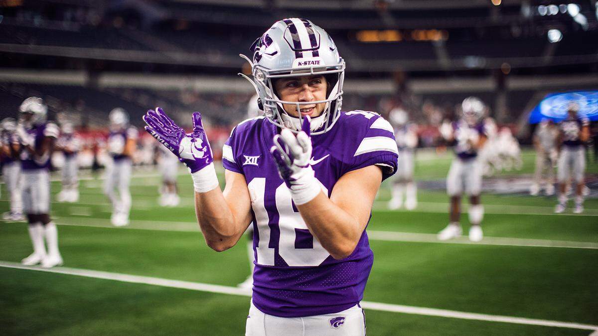 Seth Porter warms up before a K-State football game.