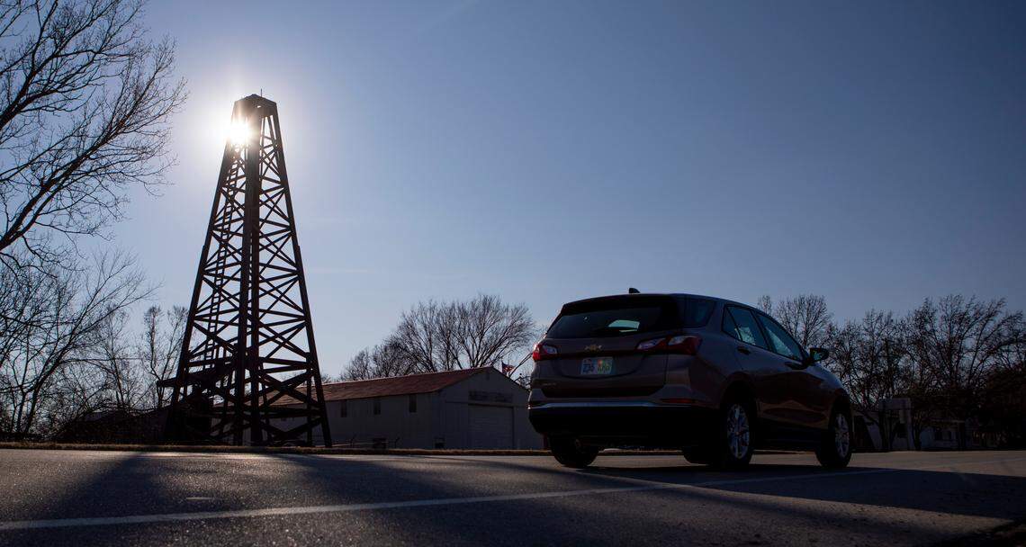 A replica of the 1892-era Norman No. 1 well, which sparked a frenzy for oil across several states, towers over the horizon near Neodesha, Kansas.
