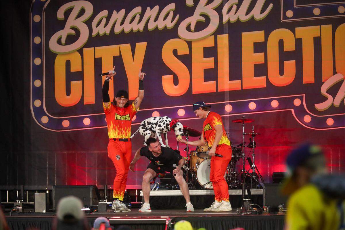 Chief, the Firefighters official bat dog delivers the ball during the Banana Ball City Selection Show on Thursday, October 9, 2025 at Historic Grayson Stadium.