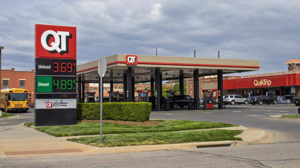 Morning commuters fill their vehicles up with gas at the QuikTrip at the corner of Douglas and N Washington. Gas prices the morning of Thursday, April 30, were $3.69 per gallon unleaded and $4.89 for diesel.