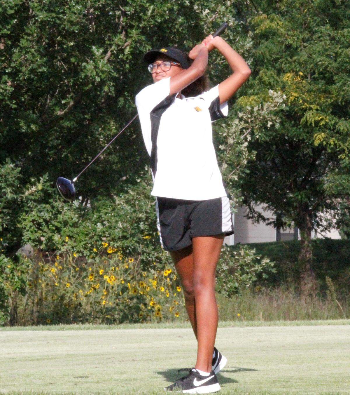 One of Wichita Southeast’s two varsity girls golfer takes a shot at the City League golf tournament at Auburn Hills on Tuesday. (Sept. 11, 2018)