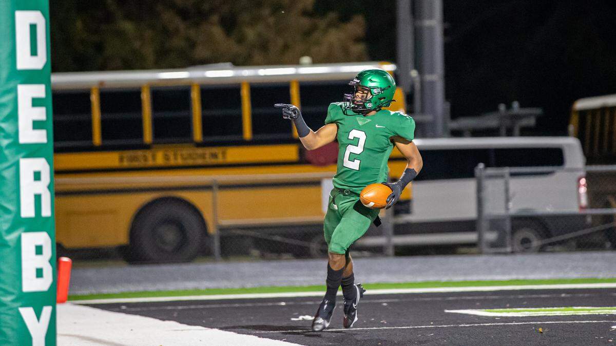 Derby running back Dylan Edwards celebrates after scoring a touchdown in the Panthers’ 27-21 win over Lawrence Free State on Friday.