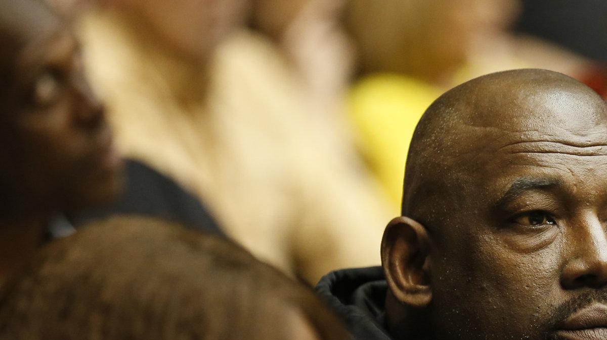 WSU great Antoine Carr takes in the WSU-Missouri State game in the second half at Koch Arena in Wichita, Kansas Saturday. (Feb.9, 2013)