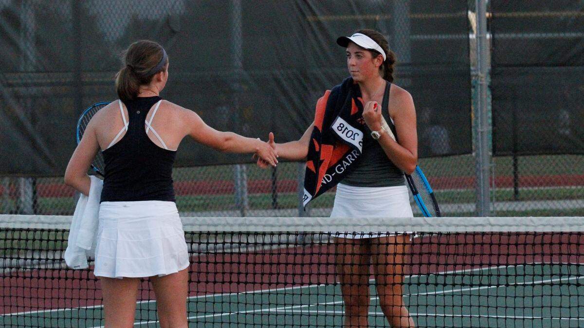Kapaun’s Clara Whitaker (left) beat Carroll’s Brittany Steven (right) 6-3, 6-3 on Monday. (Sept. 17, 2018)