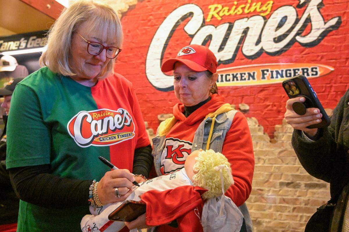 Raising Cane’s is known for getting athletes (and their relatives) to serve food on special occasions. This photo of Donna Kelce, the mother of Chiefs tight end Travis Kelce and former Eagles center Jason Kelce, was taken in November 2023 at the Overland Park restaurant.