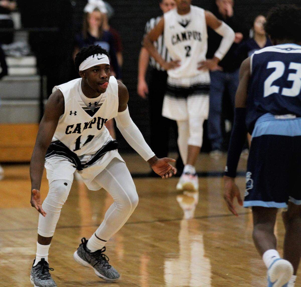 Campus junior Steele Chapman welcomes Wichita East’s Fontaine Williams down the court during the Colts’ 75-47 over the Aces on Saturday in the AVCTL/GWAL Challenge. (Jan. 12, 2019)