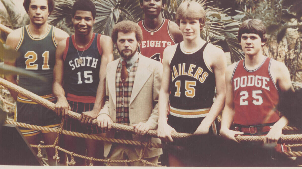 Ricky Ross, second left; Antoine Carr, middle; Dave Piehler, second right.