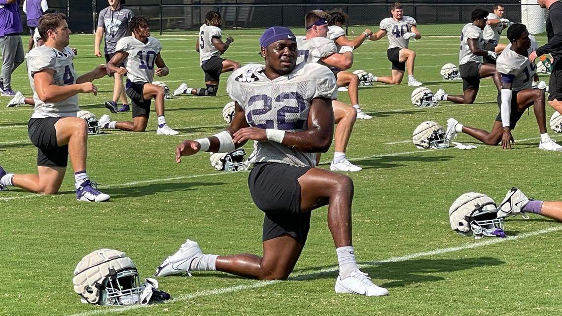 Kansas State linebacker Daniel Green stretches before the start of a Wildcats football practice.